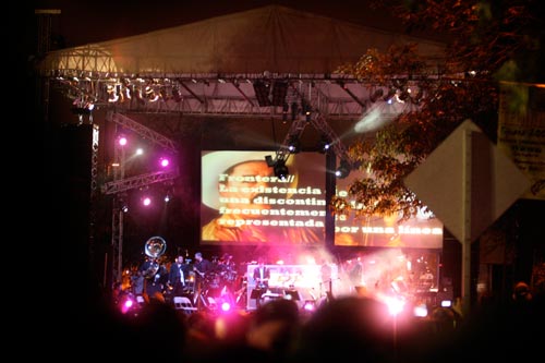 Video screens accompany the live performance.